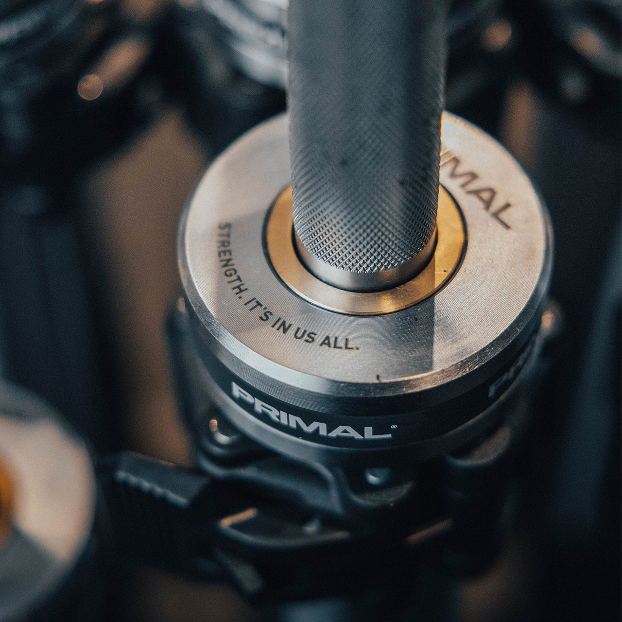 Close-up of a Primal product with branding and text.