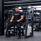 Angled view of athlete using plate-loaded pullover machine.