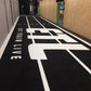 a custom etl black and white astro turf gym track
