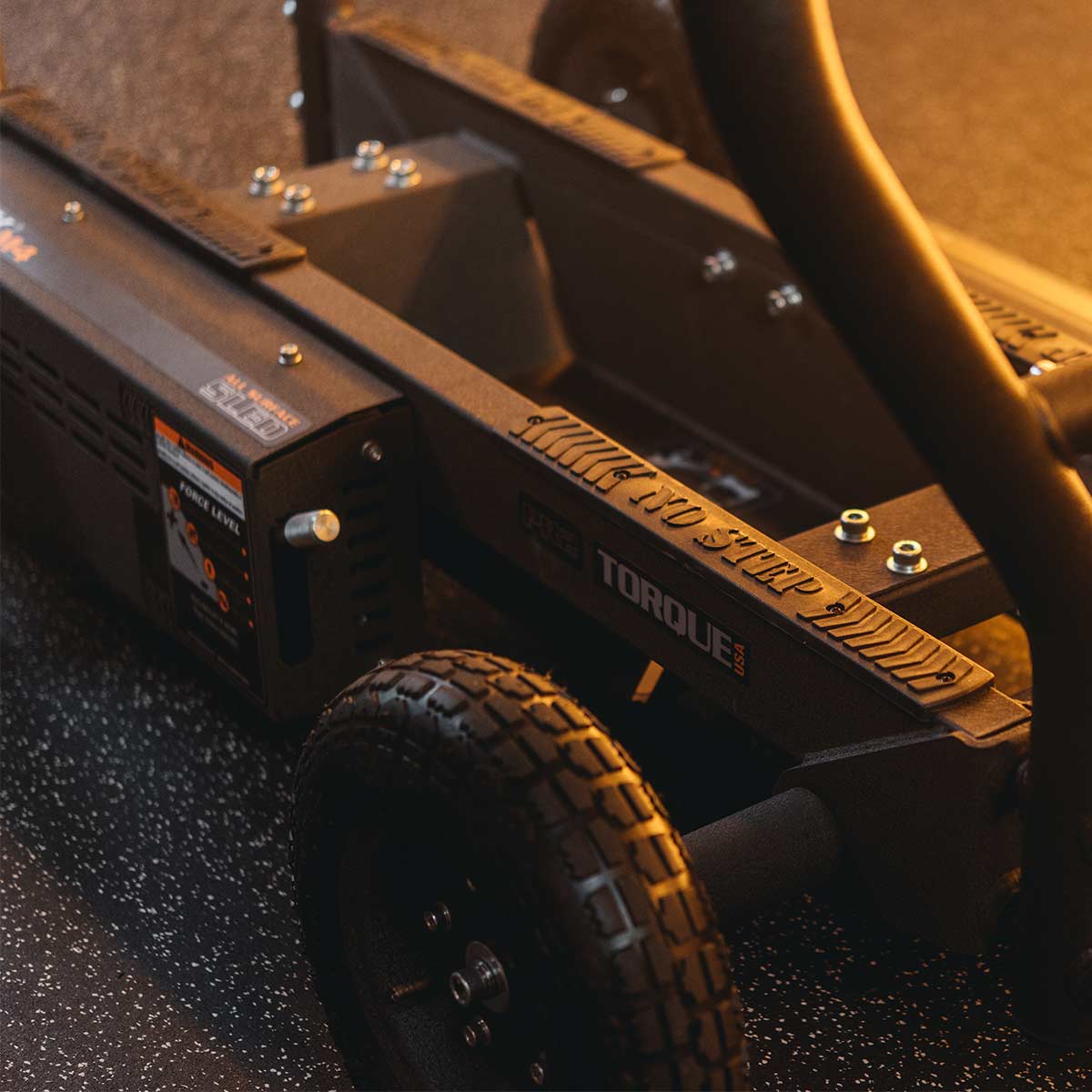 the wheel and base of a black torque m4 prowler sled
