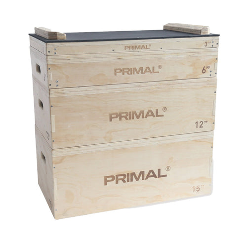 Wooden jerk block platforms for barbell workouts.