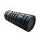 A black foam roller.