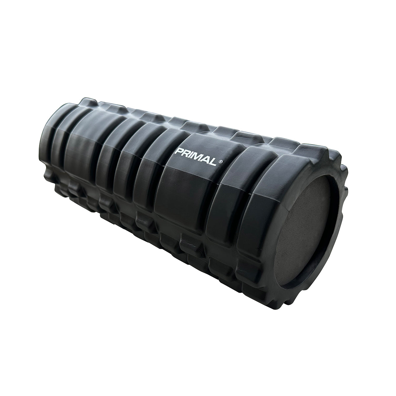 A black foam roller.