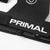 A close up of Primal stitched branding on gymnastic grips.