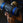 Person lifting a 20kg Primal sandbag in a gym setting.