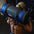 Person lifting a 20kg Primal sandbag in a gym setting.