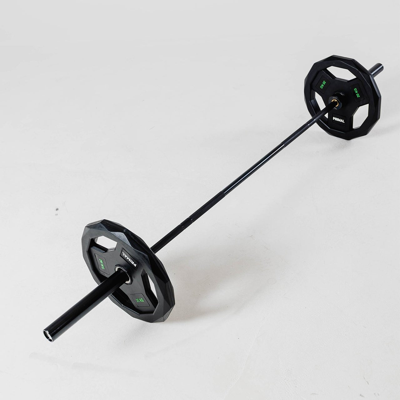 Black olympic barbell with weight plates on a white background