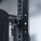A magnetic lockjaw collar stuck to a steel gym rack frame.