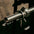 A powerlifting barbell with a competition-grade collar attached.