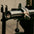 A powerlifting barbell with a competition-grade collar attached.
