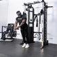 An athlete using the cable pulley system on a half rack system.