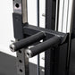 A dip handle attachment on a half rack system.