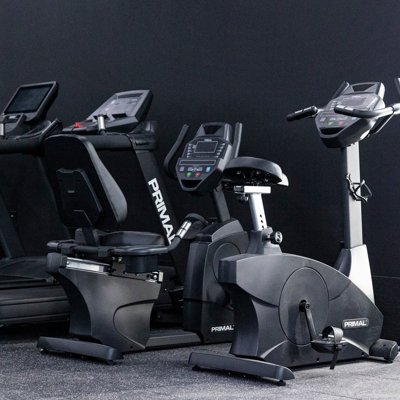 An indoor recumbent exercise bike in the cardio section of the gym.
