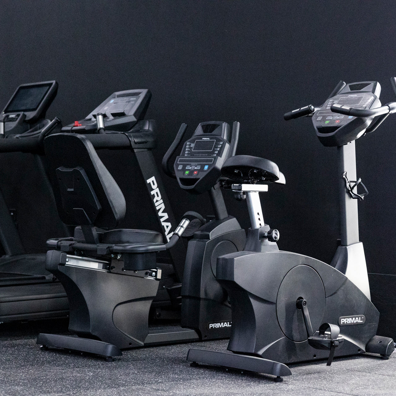 An indoor recumbent exercise bike in the cardio section of the gym.