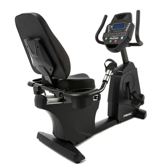 An indoor recumbent exercise bike.