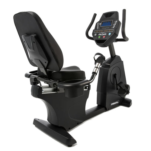 An indoor recumbent exercise bike.