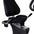 A close up of an indoor recumbent exercise bike.