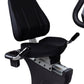 A close up of an indoor recumbent exercise bike.