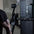 A close up of the cable pulley system on a dual arm functional trainer machine.