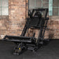Plate Loaded leg press & hack squat machine in gym environment.