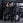 Angled view of athlete using plate-loaded pullover machine.