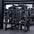 Angled view of plate-loaded pullover machine in gym setting.
