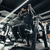 An athlete pre-stretching on a plate loaded ab crunch machine.