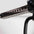 Close up view of adjustable grip function on front facing lat pulldown machine.