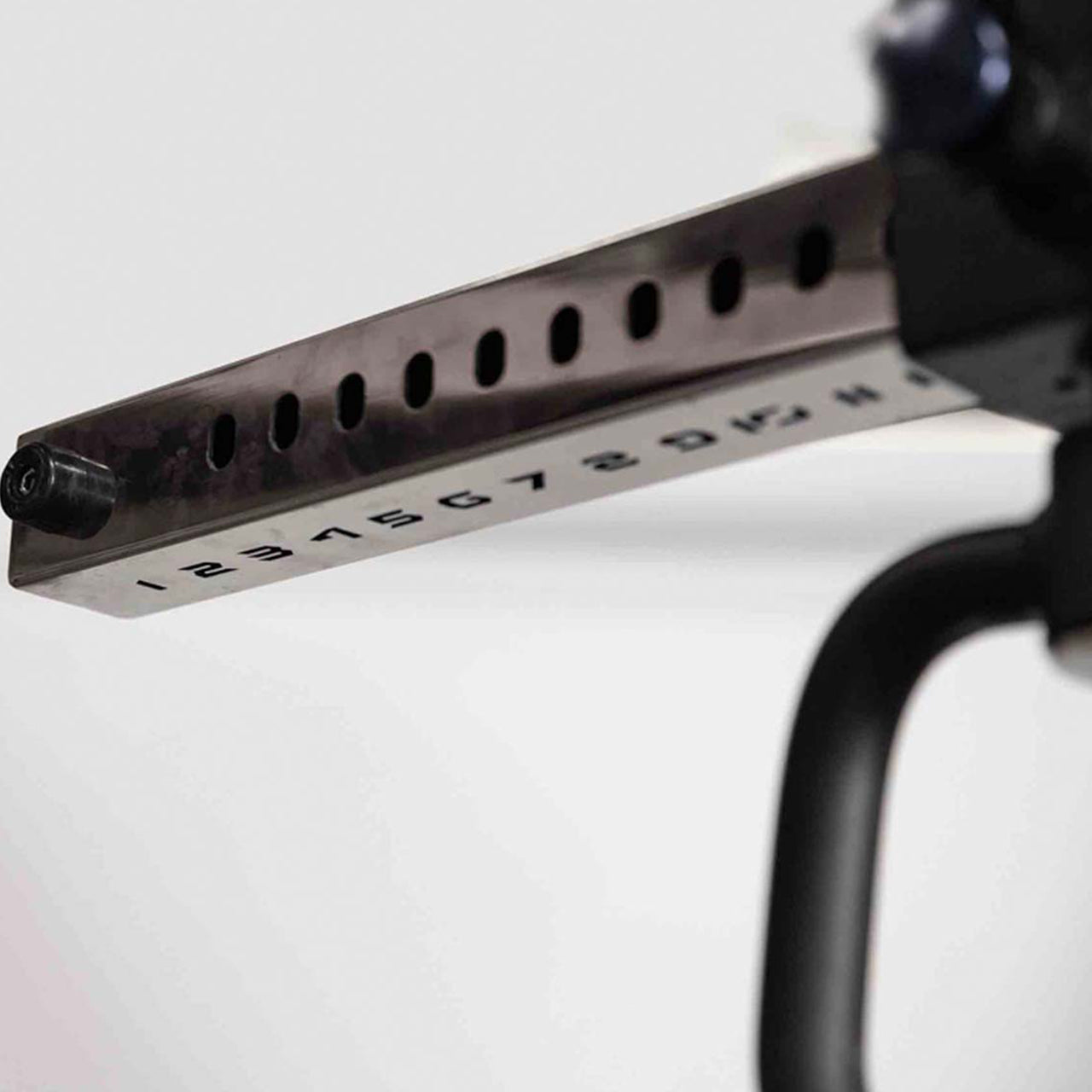 Close up view of adjustable grip function on front facing lat pulldown machine.