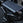 Close-up of the preacher pad on a bicep curl machine with Primal branding.