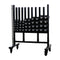 An upright dumbbell storage rack with wheels for urethane studio dumbbells.