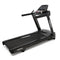 A treadmill cardio machine with console.