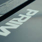 Close-up of a treadmill surface with the Primal brand name printed on it.