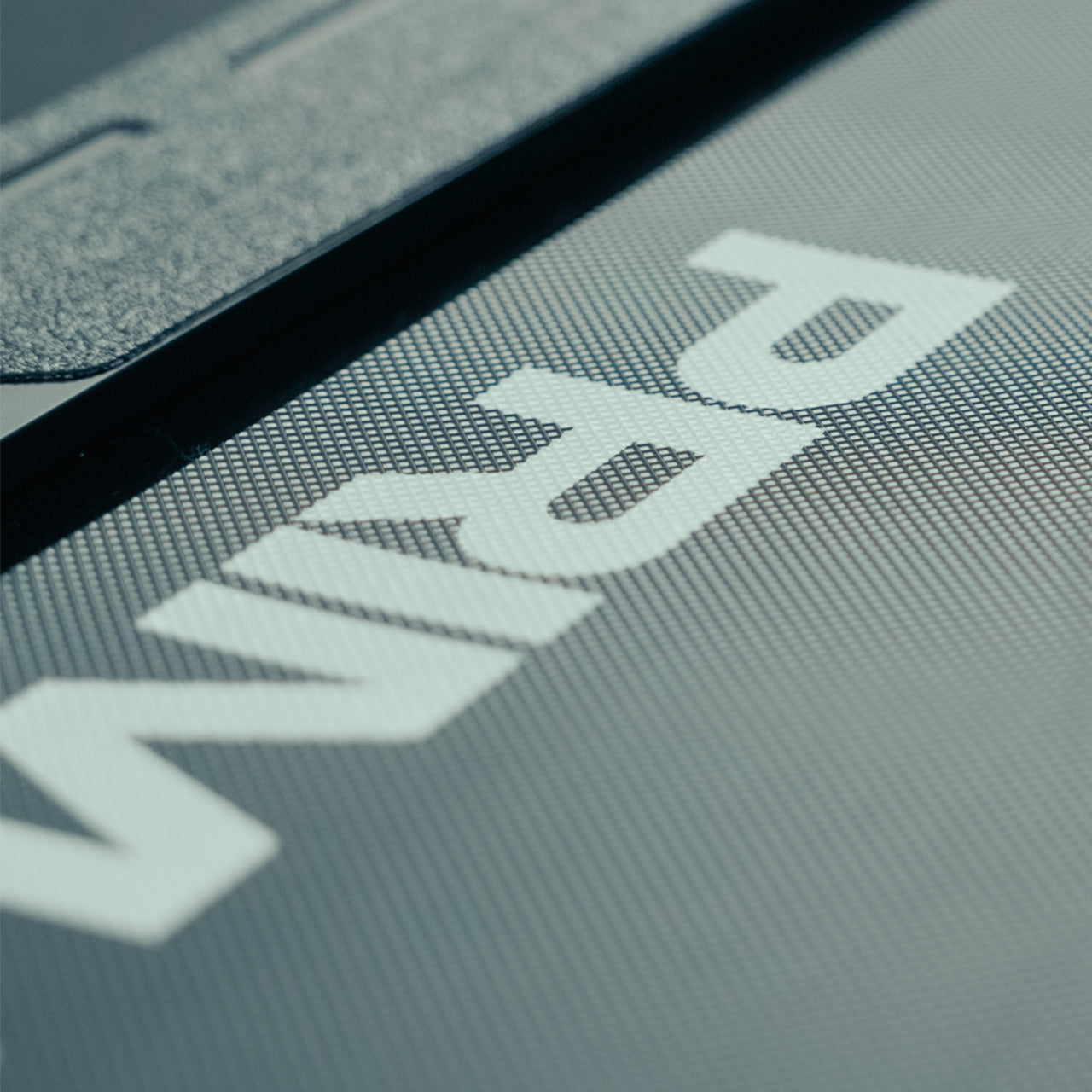 Close-up of a treadmill surface with the Primal brand name printed on it.