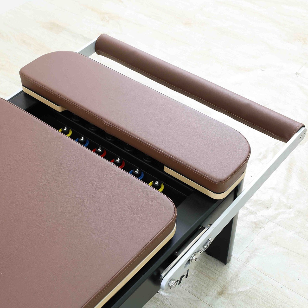 Close up of the padding on a pilates reormer bed.