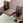 Brown leather material on a pilates reformer machine.