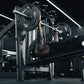 An athlete performing a decline bench press with a loaded barbell.