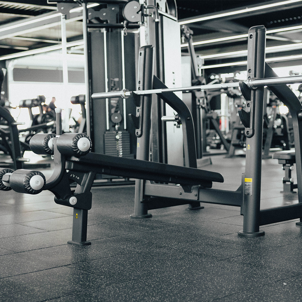 A side profile of an Olympic decline weight bench.