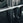 A barbell resting on a j-hook.