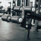 Leg pads on an Olympic decline weight bench.