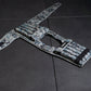 Camouflage-patterned weighted vest on a gym floor.
