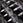 A close up of hex dumbbells with steel handles.