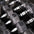 A close up of hex dumbbells with steel handles.
