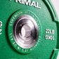 Close-up of a green weight plate with 'Primal' branding and weight measurement.