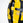 Yellow and black weightlifting plate with '15kg' and '33lbs' text on a white background