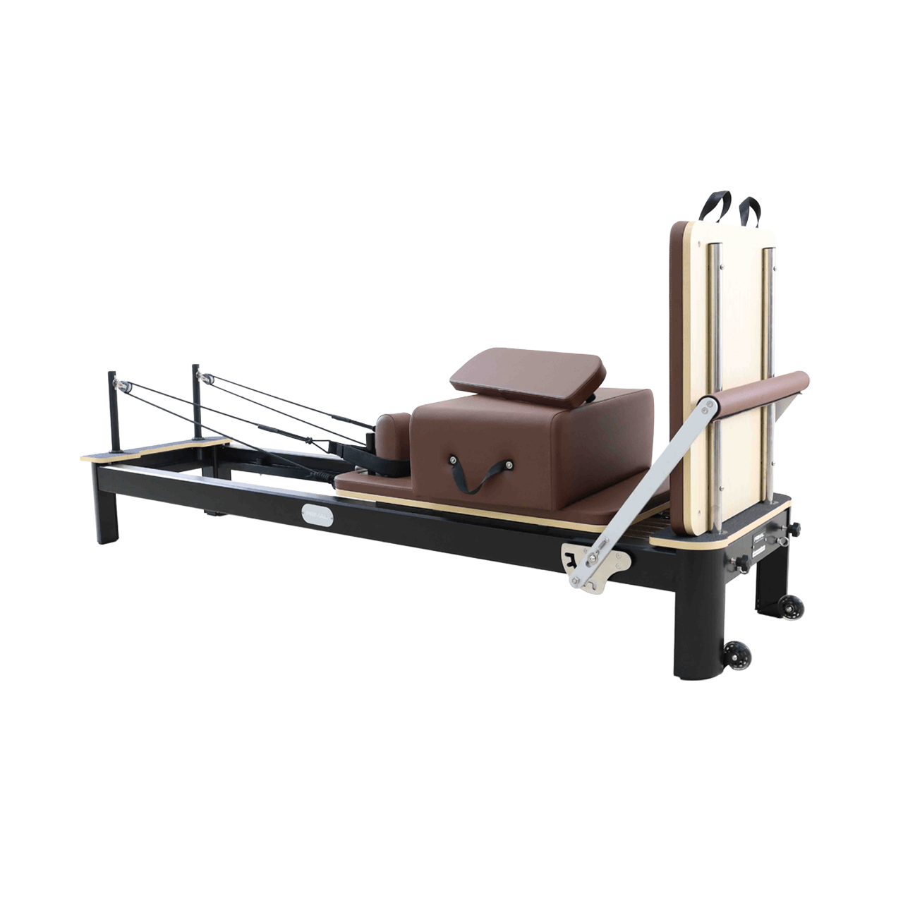 Pilates reformer machine on a white background