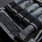 Close up the 2kg weight packs stored inside a 20kg camouflage weighted vest.