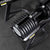 A top-down view of a 34kg adjustable dumbbell on a storage stand.