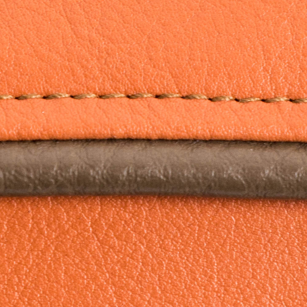 orange leather with brown stitching