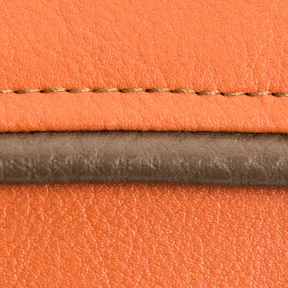 orange leather with brown stitching